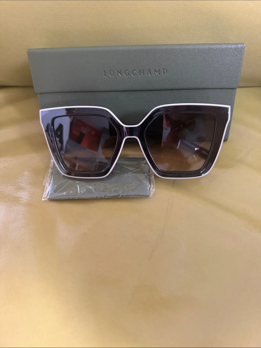 Longchamp New Style Black Frame Sunglasses with Brown Gradient Lenses